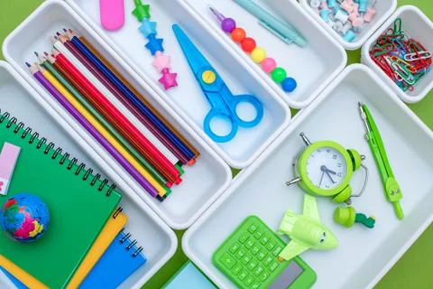 School supplies.Concept back to school. colored stationery is arranged in white Stock Photos