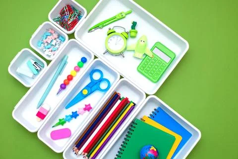 School supplies.Concept back to school. colored stationery is arranged in white Stock Photos