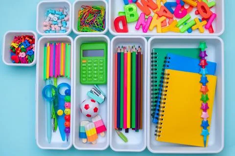 School supplies.Concept back to school. colored stationery is arranged in white Stock Photos