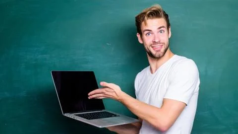 School teacher programming with laptop. Student learn programming language Foto stock