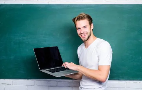 School teacher programming with laptop. Student learn programming language Foto stock