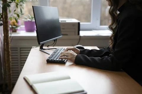School teacher working using computer in the classroom Stock Photos