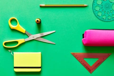 School tools over a blue flatlay in blue from above Stock Photos