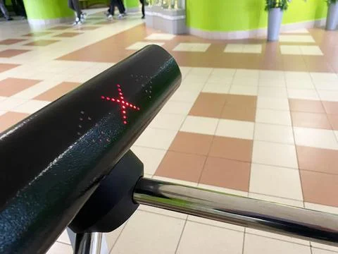School turnstile with red access control indicator, showcasing security features Stock Photos