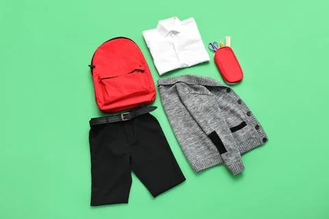 School uniform with red backpack and pencil case, back to School concept, edu Stock Photos