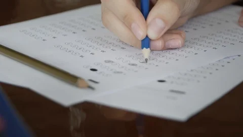 School / university Students hands taking exams, writing examination room wit Stock Footage 113347770