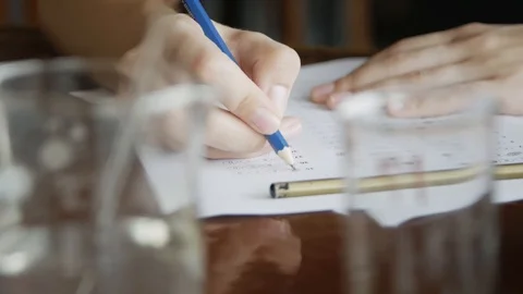 School / university Students hands taking exams, writing examination room wit 库存影片 113347825