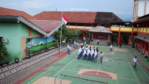 School yard shows the main building, playground and markers Stock Footage 218569998