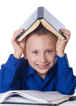 Schoolboy with book Stock Photos