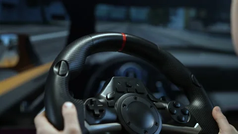 Schoolboy child driving simulator game on pc computer. Young boy using play Stock Footage 168480989
