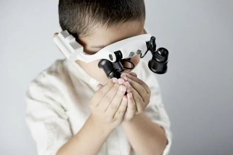 Schoolboy conducting scientific experiments Stock Photos