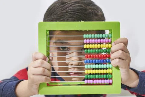 A schoolboy do mental math Stock Photos