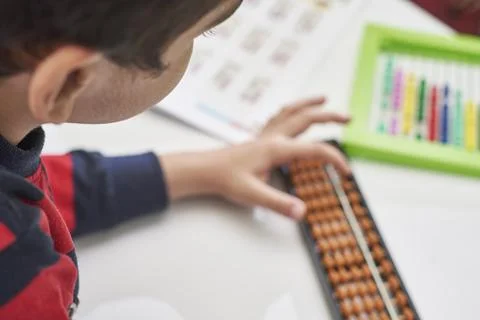 A schoolboy do mental math Stock Photos