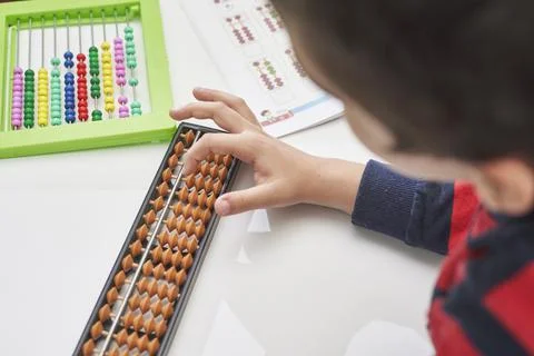 A schoolboy do mental math Stock Photos