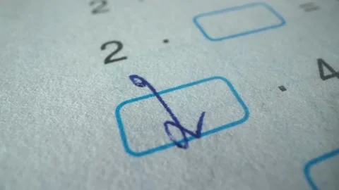 The schoolboy is doing his homework. He correctly solves a simple task. Panorama Stock Footage 141185120