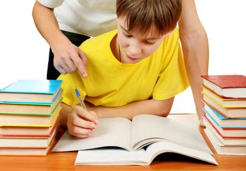 Schoolboy doing Homework Foto stock