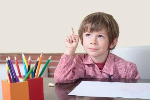 Schoolboy doubt or idea Stock Photos