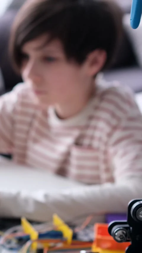 Schoolboy Engaged With Laptop And 3D Printer In Workshop Stock Footage 303930657