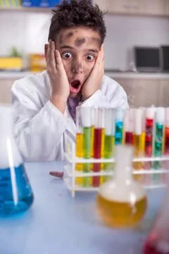 Schoolboy Experiment in the school lab Stock Photos