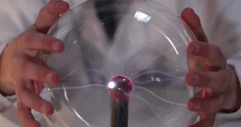 Schoolboy experimenting in physics class. Young student doing physics experiment Stock Footage 176200338