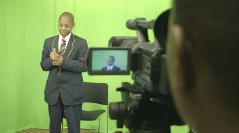 Schoolboy explaining Stock Footage 32698350