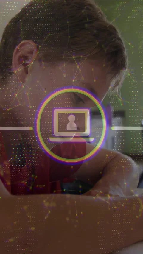 Schoolboy leaning over table looking down and starting dotted net monitor icon Stock Footage 331337188