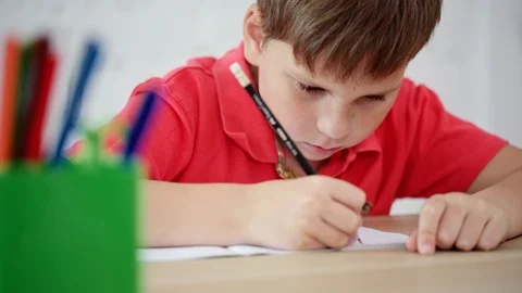 The schoolboy learns to write Stock Footage 92035144