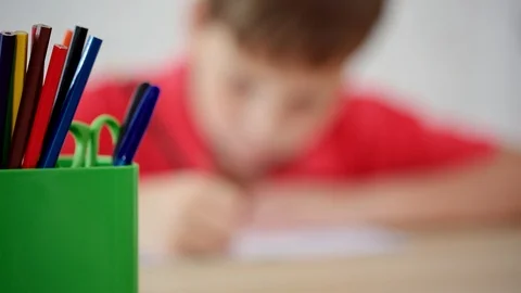 The schoolboy learns to write Stock Footage 92036514