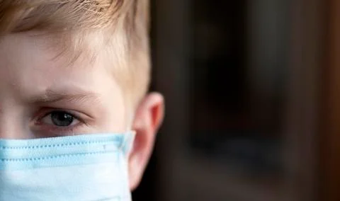 Schoolboy with protective mask. Stock Photos