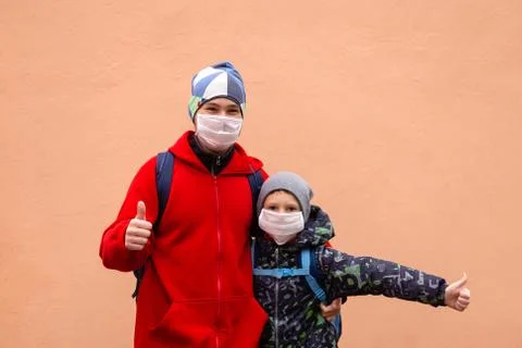 Schoolboy shows class in protective mask Stock Photos