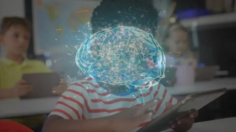 Schoolboy tapping tablet screen and revealing holographic brain projection for Stock Footage 318239114