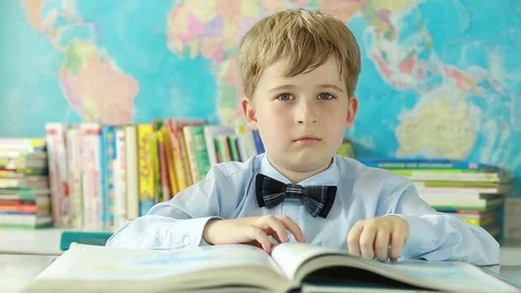 A schoolboy tired of study Stock Footage 78239397