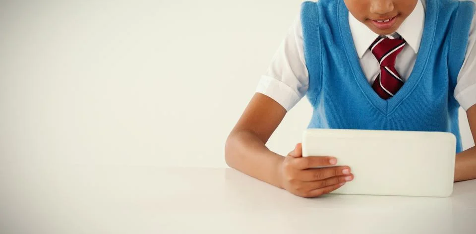 Schoolboy using digital tablet Foto stock