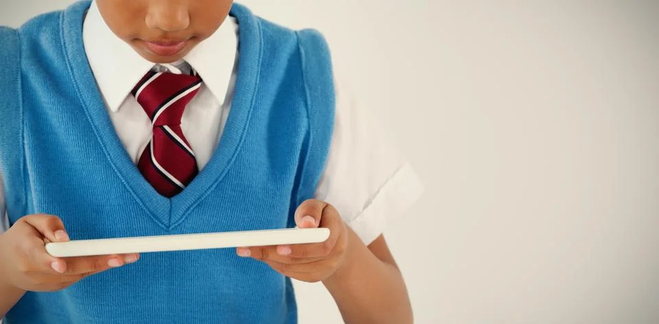 Schoolboy using digital tablet Stock Photos