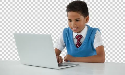 Schoolboy using laptop over white background Stock Photos