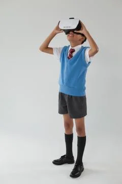 Schoolboy using virtual reality headset Stock Photos