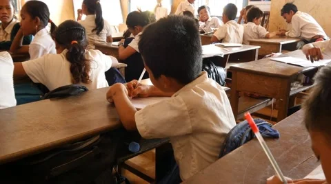 Schoolboy writing learning in classroom 4k Cambodia Asia disciplined Stock Footage 56643532