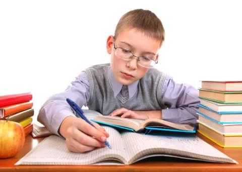 Schoolboy writing Foto stock