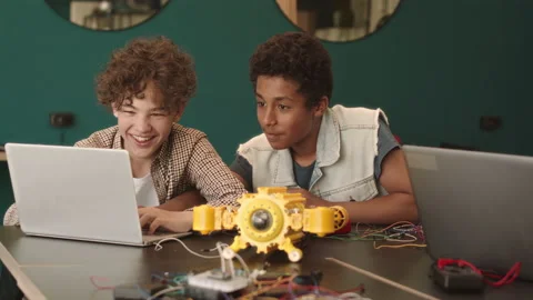 Schoolboys Constructing Robot at Electronics Class Video stock 204894737