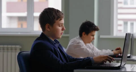 Schoolboys In Modern Computer-Based Classroom, Teens Students Practicing In Stock Footage 280172491