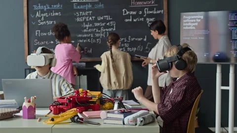 Schoolboys Wearing Vr Headsets during Robotics and Coding Lesson Stock Footage 339201654