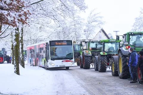  A schoolbus is blocked while farmers demonstrate for diesel subsidies and... Stock Photos