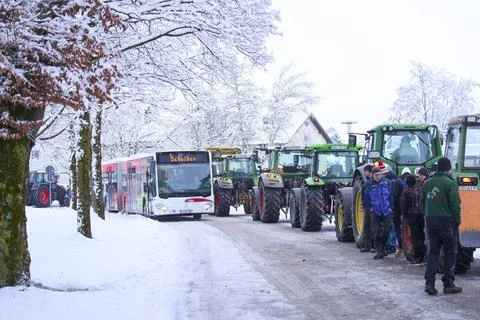  A schoolbus is blocked while farmers demonstrate for diesel subsidies and... Stock Photos