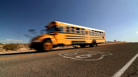 Schoolbus on Route 66 plus sign (Landscape) Stock Footage 34275676