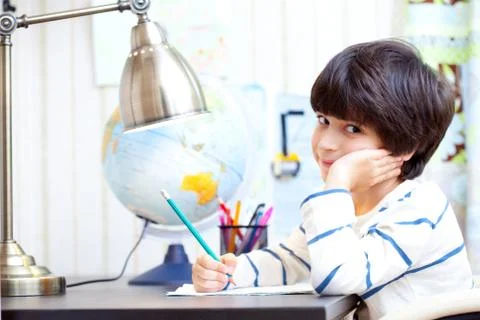 Schoolchild doing homework Foto stock