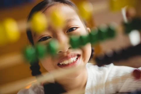 Schoolchild using a slide rule Stock Photos