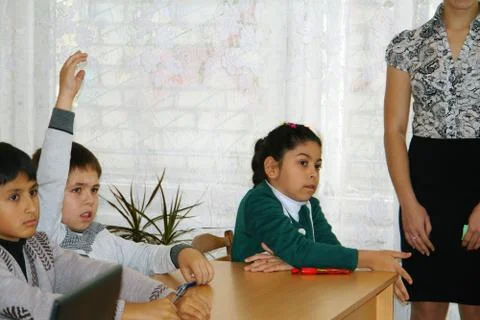Schoolchildren in classroom Stock Photos