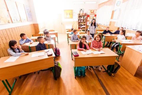 Schoolchildren in the classroom Stock Photos