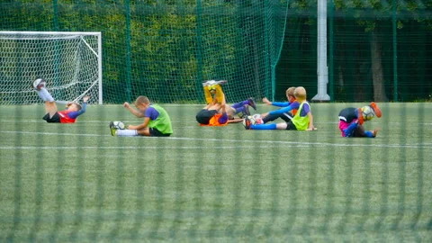 Schoolchildren soccer training Stock Footage 122283366