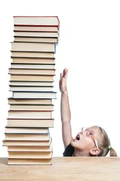 Schoolgirl extends to knowledge Stock Photos